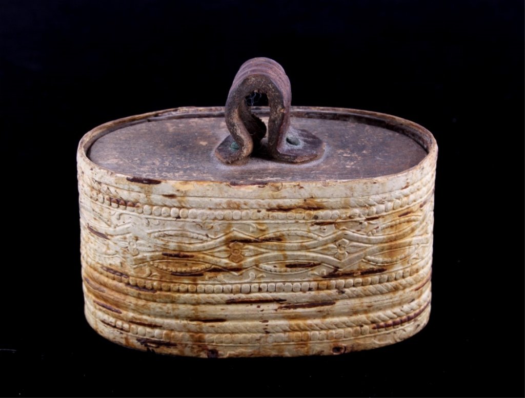 Cree Birch Embossed Snuff Box This is a Cree Nativ: This is a Cree Native American Indian snuff box. The box shows a worked embossed design around the outside made of birch tree bark. The top and bottom are carved wood. This is an early 1880-1920 piece
