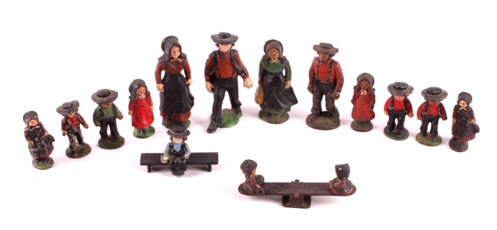 Cast Iron Amish Figures This lot includes 15 cast: This lot includes 15 cast iron Amish figures. Each figure is hand painted and shows good detail. They are all in good condition. Most do show some degree of paint loss. The tallest figure measures 4.7