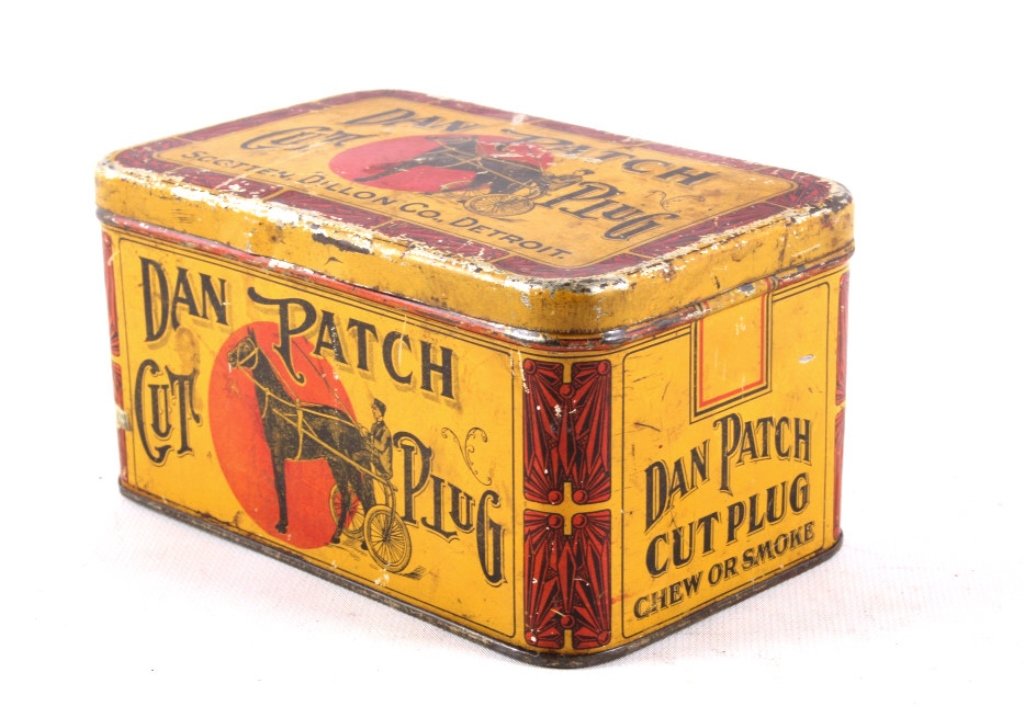 Antique Dan Patch Cut Plug Advertising Tin This is: This is an original Dan Patch Cut Plug Scotten, Dillon Co. Detroit Horse and Jockey cart advertising tobacco tin. The piece shows wear across the top, but overall a rare piece. Early 1900's. Measures 