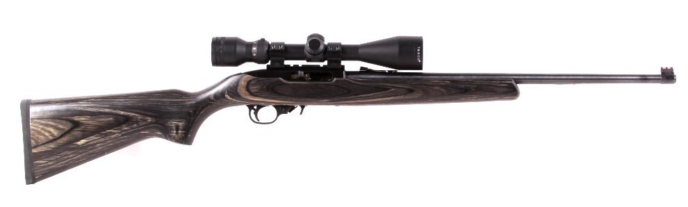 Ruger 10/22 .22 LR Caliber Carbine This is a Ruger: This is a Ruger Newport N.H. USA Model 10/22 .22 long rifle caliber carbine. The rifle has a Tasco World Class Plus 3x-9x44 scope. Blued barrel and Laminated Grey wood stock. Serial number 359-07288. 
