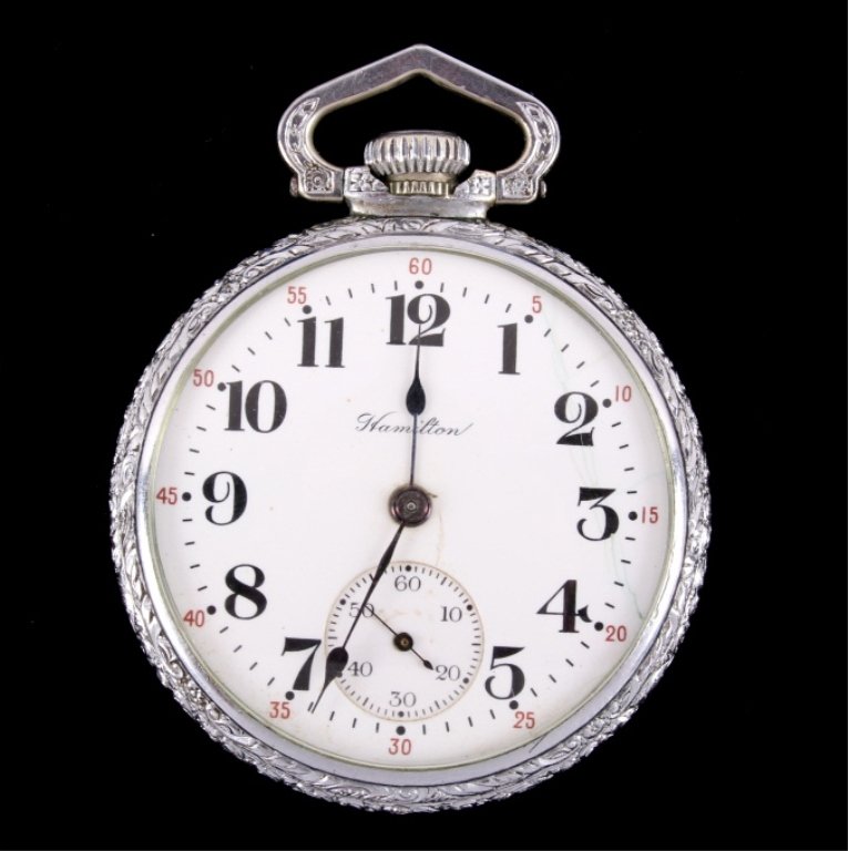 Hamilton 974 Railroad Pocket Watch circa 1915: This is a Hamilton Watch Co. Railroad pocket watch. The watch is a 974 grade, Size 16, Model 1, with a 17 Jewel nickel movement. Serial number 1169073 manufactured in 1915. This is in excellent workin