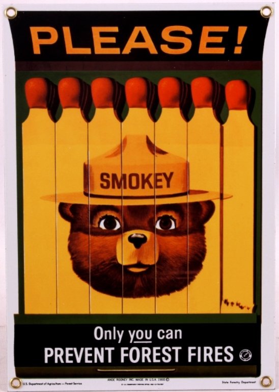 Smokey Bear Porcelain Sign: This is a Smokey Bear porcelain sign. Smokey Bear was adopted by the U.S. Forest Service back in the 1940's as part of their campaign to prevent forest fires. This sign shows a book of matches with Sm