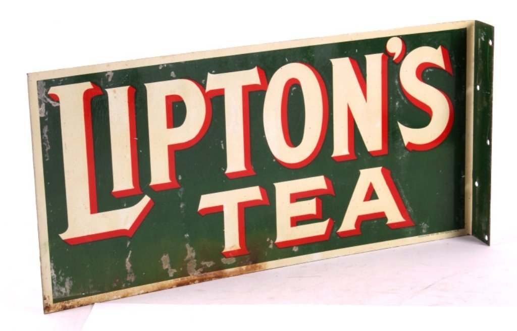 Lipton's Tea Sign: This is a Lipton's Tea sign. The sign is double sided and is flanged as well. The sign is from the early 1900's. It shows bright, vivid colors. The Lipton's Tea sign is in good condition. There is som