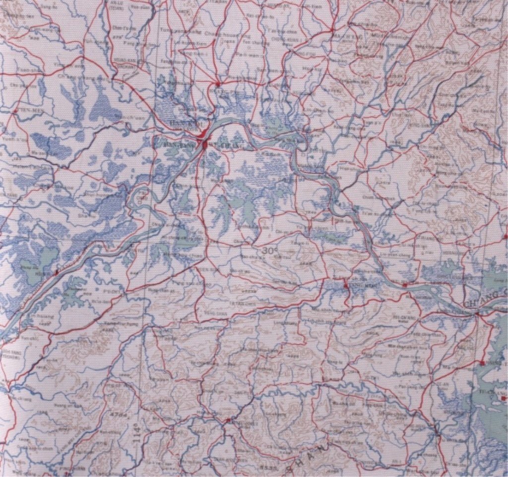 Korean War Escape and Evasion Map of Asia: This is a Korean War era escape and evasion map of Honshu and China. Maps such as this are made from silk. They were carried by bomber flight crews and fighter pilots. United States Air Force Cloth Ch