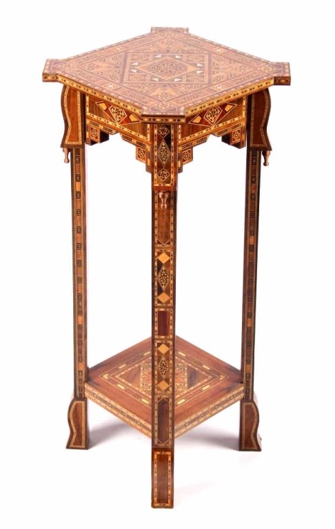 Vintage Wunderley Syrian Inlaid Mosaic Table: This is a hand crafted work of art inlaid mosaic table made in Syria by Wunderley. Wunderley is a high end Middle Eastern furniture company. This piece shows an excellent inlaid design with many exoti