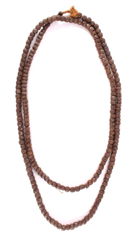 Ivory Coast Tribal Hammered Iron Beads: The lot features a rare set of hand hammered and forged round iron trade bead necklace from the African Ivory Coast Tribal people. The antique necklace is strung on a grass braided cord. These each ar