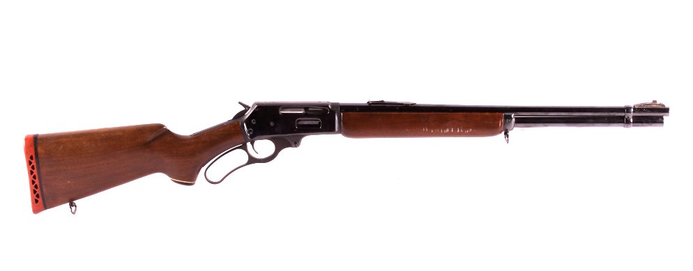 Marlin Firearms Company .30-30 Lever Action Rifle: This is a lever action .30-30 rifle made by The Marlin Firearms Company of New Haven, Conn. The rifle is a model 336. It features a solid hardwood stock. The rifle also has a "Micro Groove" barrel. Th