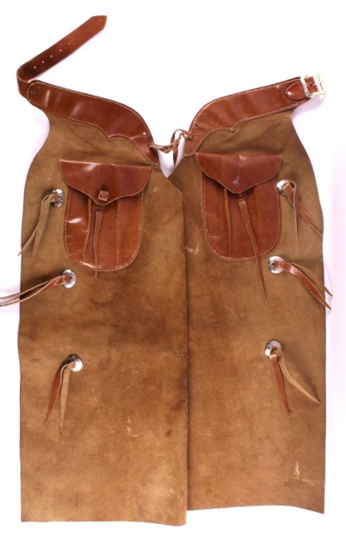 Leather Batwing Cowboy Chaps: This is a pair of leather batwing cowboy chaps The chaps feature silver concho accents. They are in good condition. The chaps measure 37" long.