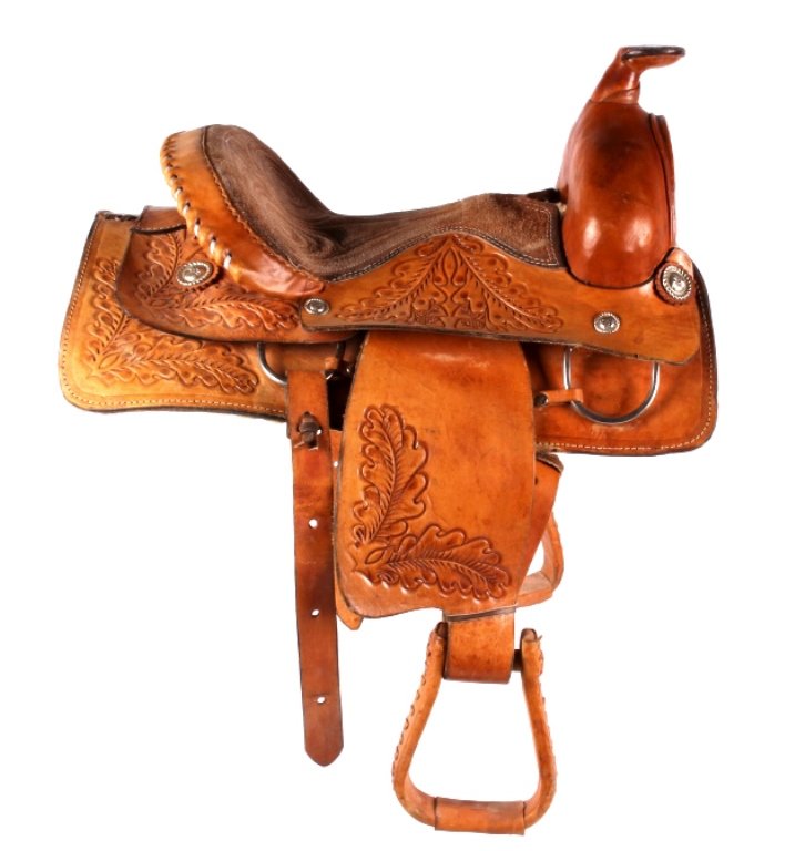 Western Tooled Leather Show Saddle: The saddle shows a heavily hand carved tooled design on genuine leather saddle. The piece is hand crafted and shows good condition with little to no wear. The piece is believed to be crafted in the US