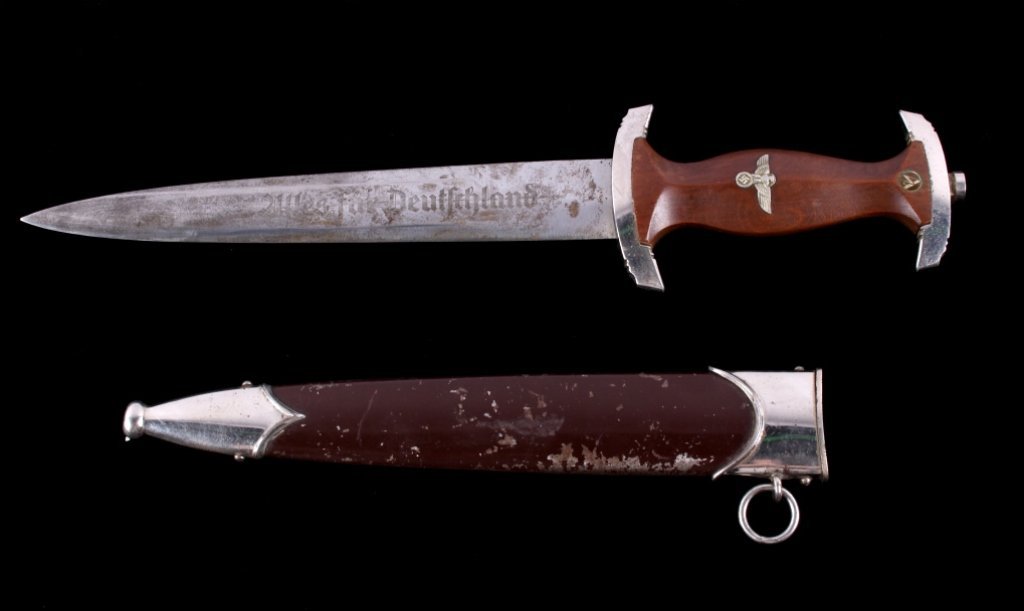 WWII Nazi Storm Trooper Motor Corp Heer Dagger: The piece is from the World War II (WW2) and is a German Nazi Dagger. The Officers dagger features a brown wood handle with and brown sheath. WWII German Nazi "Rohm" Sturmabteilung (Storm Troopers) da