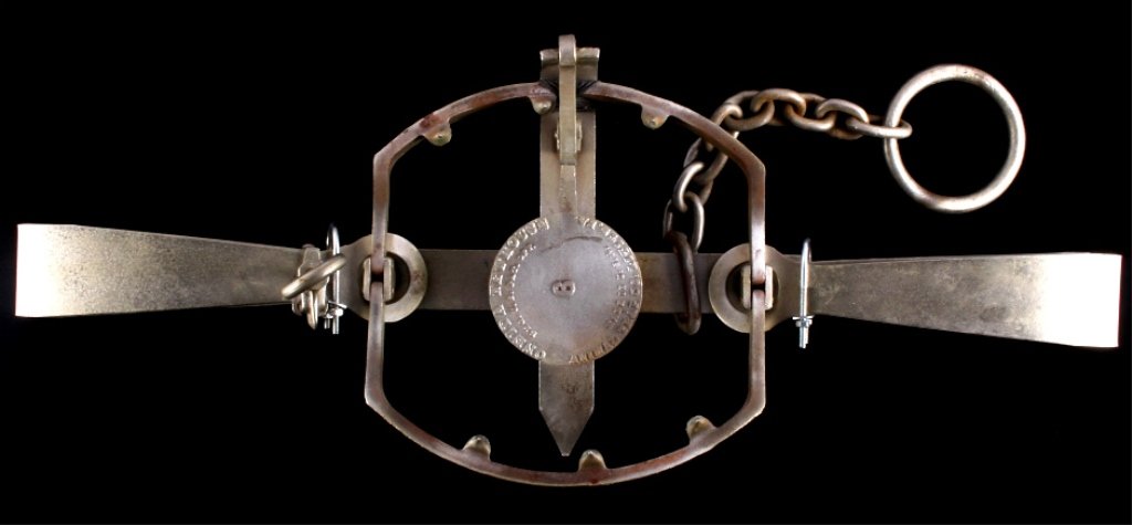 Newhouse #6 ATC Bear Trap Nickel Plated with Teeth: Pan reads, "Oneida Newhouse Animal Trap Co. Lititz, PA. REG. U.S. PAT. OFF. 6 Made in U.S.A." Manufactured after 1927, and has the original large teeth. Most of the late No. 6 traps with cast without 