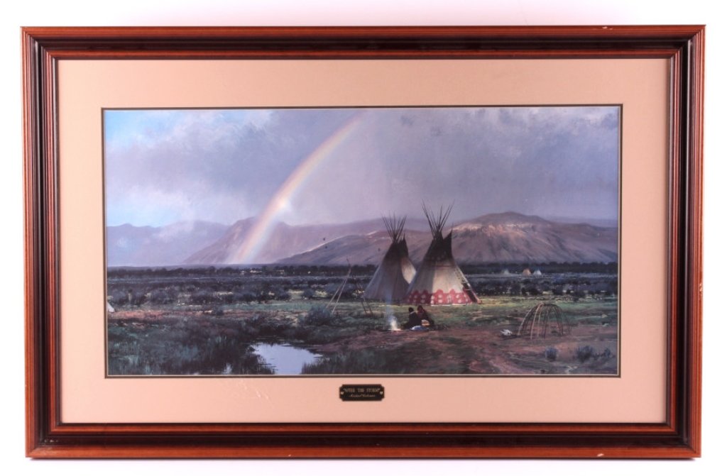 Michael Coleman Framed Native American Print: This is a framed Native American print by Michael Coleman. The print is titled "After the Storm" and shows a Native American camp with teepees in the foreground with the mountains and rainbow in the b