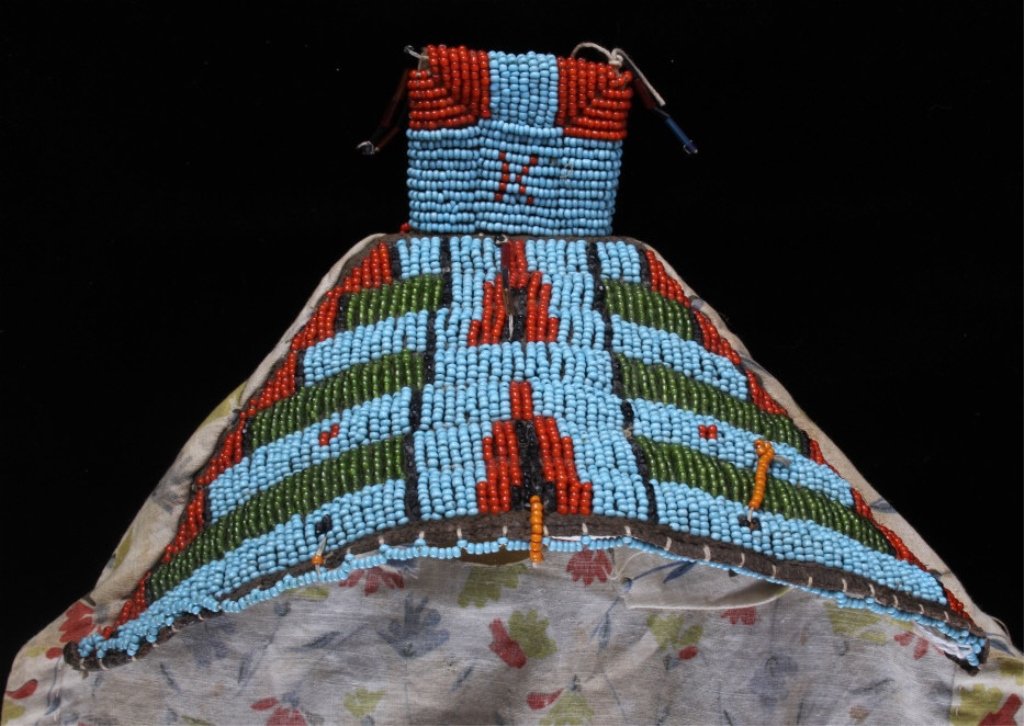 Cheyenne Beaded Cradle Cover Otto Ernst circa 1890: The lot features a beaded Cheyenne Native American Indian child's cradle cover from circa 1880-1890. The rare piece shows early glass trade seed beads from the 19th century all sinew and cotton sewn o