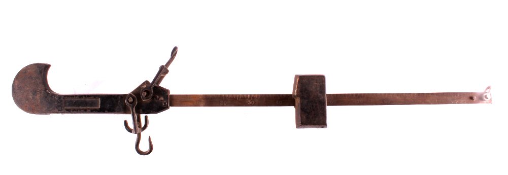 Antique Hanging Scale: This is an antique hanging beam scale. The scale is made from cast iron and steel. It shows good condition. Great for weighing game animals or for use as Western decor. The scale measures 40.5" long.