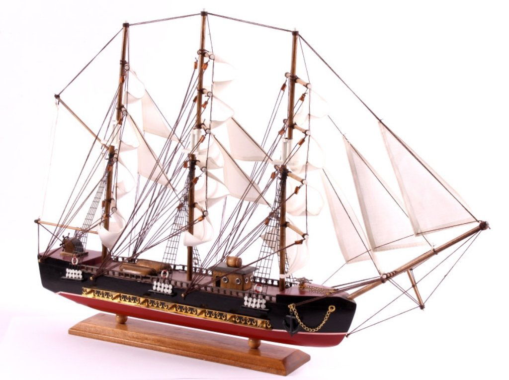 Wooden Sailing Ship Model: This is a wooden sailing ship model. It is an exact replica of the full size Spanish ship. The model shows great detail. The deck shows life boats and ship's wheel. There are also cannons that line bo