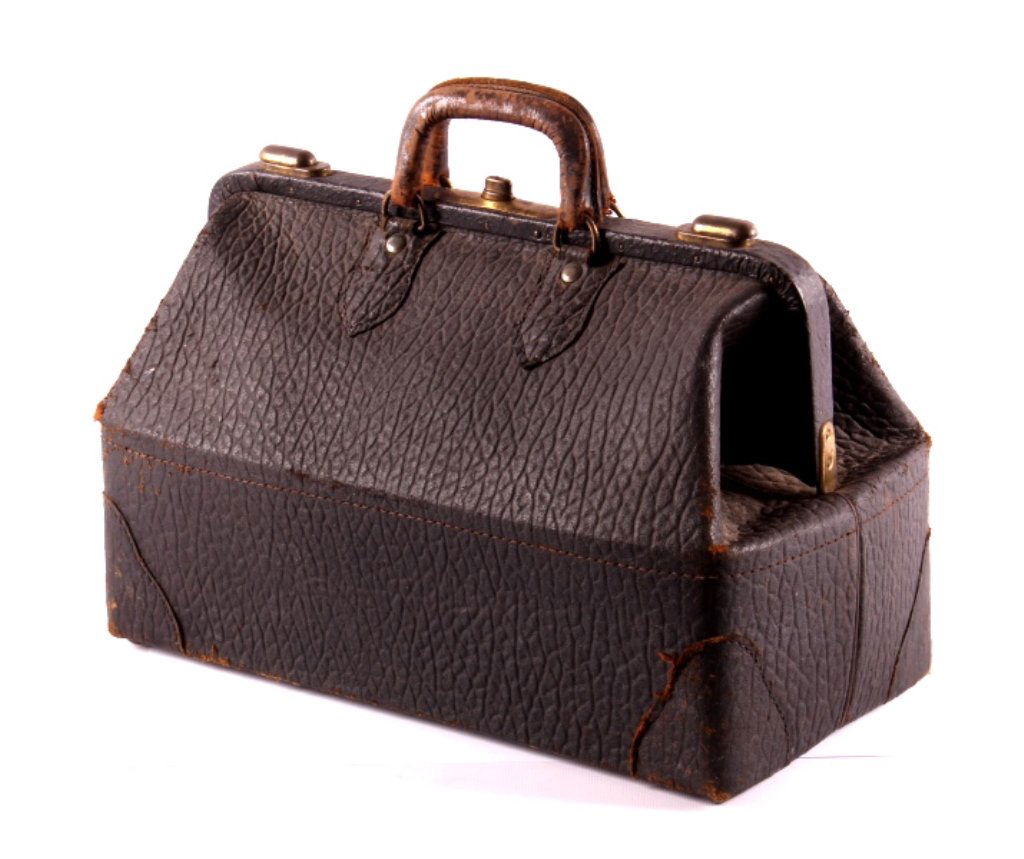 Antique Leather Doctor's Bag: This is an antique leather doctor's bag from the late 1800's to early 1900's. This is a great early piece that features the original handles and hardware. The doctor's bag is in good overall condition