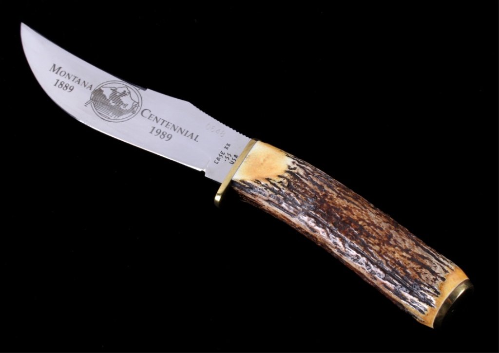 Montana Centennial Case XX 523-5 SS Knife: New old stock original Case XX Stainless Steel USA made Model 523-5 Montana Centennial fixed blade knife. The knife has a rich Elk Horn handle with brass end and hilt and the blade is etched Montana C