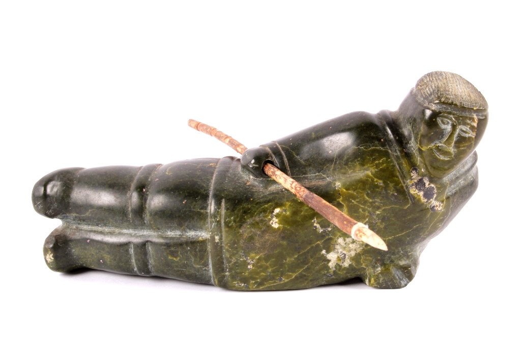 Eskimo Inuit Seal Hunter Soap Stone Sculpture: The lot features a hand carved original Eskimo Inuit Native American Indian soap stone sculpture. The piece has a tag across the botom marked, "Canada - Eskimo Art" and hand etched with the tribe numb