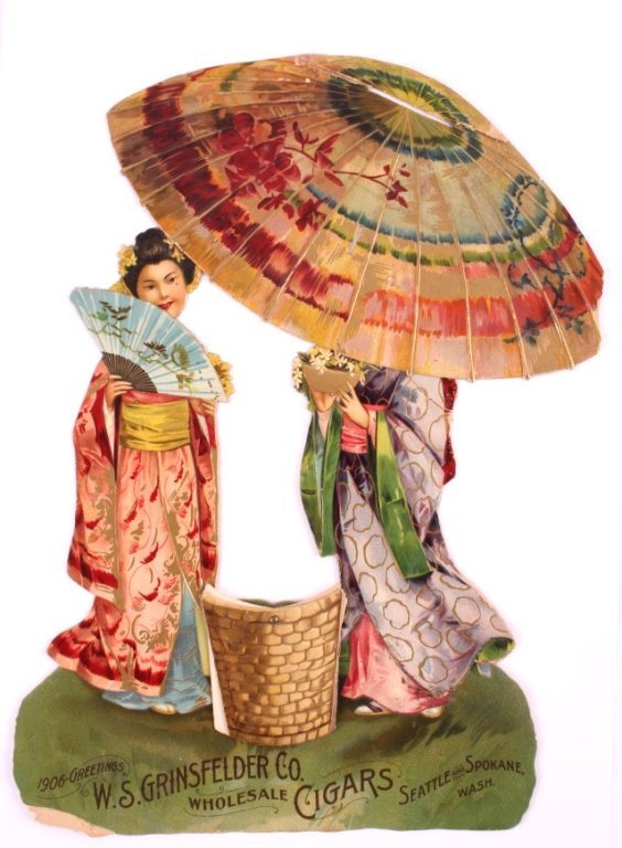 1906 Grinsfelder Cigar Advertising Calendar: This is a Grinsfelder cigar advertising calendar from 1906. The calendar shows a Japanese girl holding a fan while another girl stands under a parasol. The basket turns to show the months. The cigar a