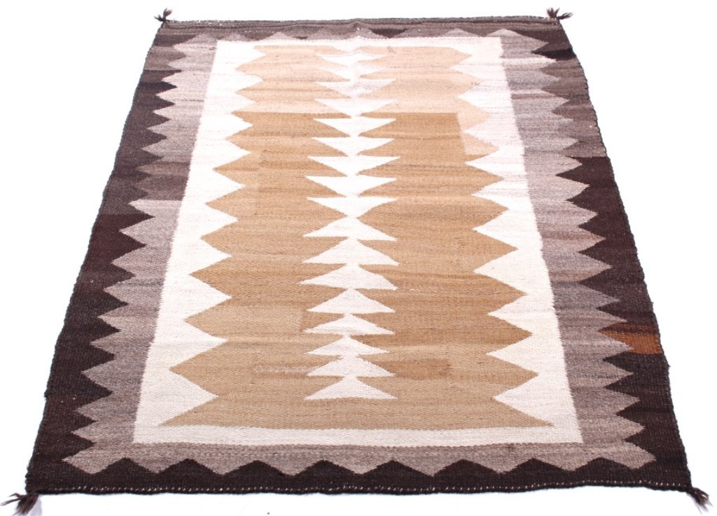 Navajo Crystal Eyedazzler Pattern Rug c. 1900: The rug features an excellent Crystal Eyedazzler pattern rug from a skilled Navajo Native American Indian weaver. The piece is from circa 1900 and shows some wear, but overall good condition for its a