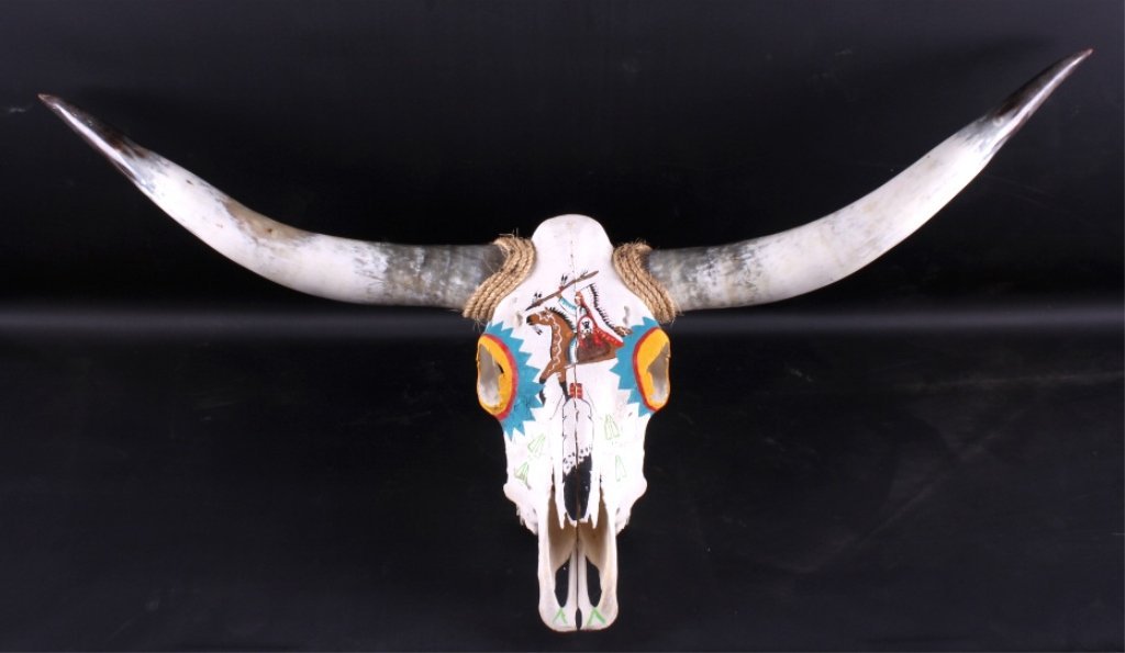 Native American Painted Longhorn Skull: This is a Native American painted longhorn skull. The skull is hand painted and shows a Native American warrior on horseback with a long headdress and spear. The horns and skull show good condition. T