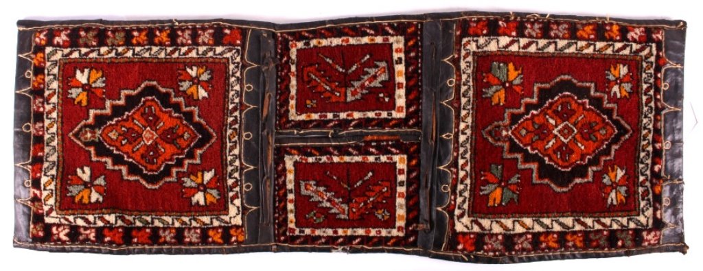 Hand Woven Turkish Camel Blanket: This is an antique Turkish camel blanket. The blanket was hand woven in a traditional style with natural fibers and dyes. This is a beautiful piece that shows good condition. It measures 18" x 51".