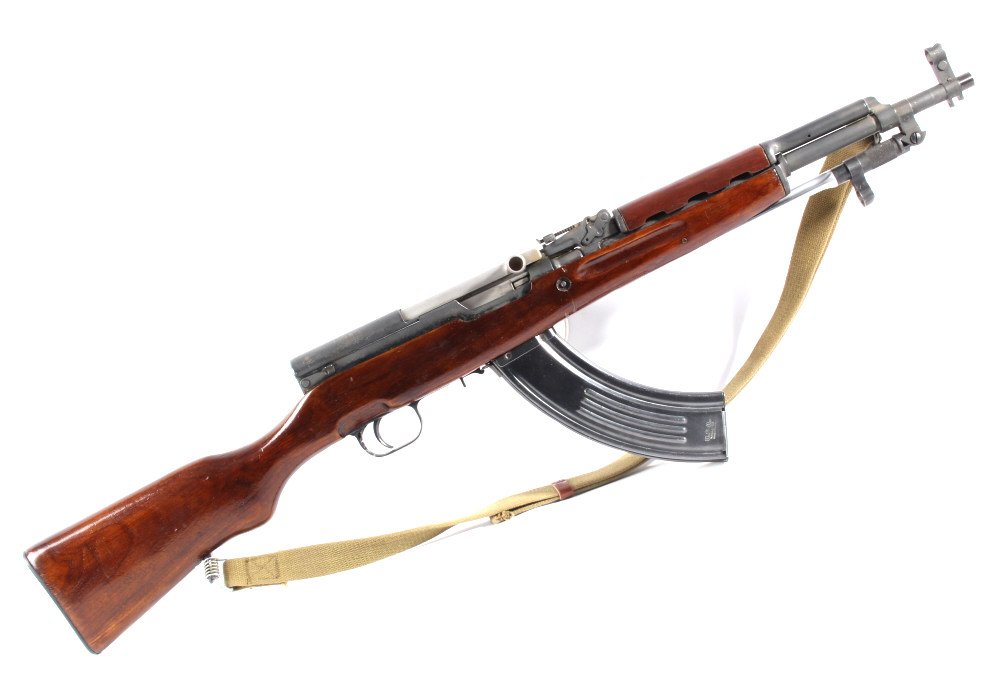 Rare Chinese Paratrooper Carbine SKS Rifle: This is an original 16" barrel rare Chinese Paratrooper carbine SKS. The side is marked by importer, "SKS 7.62x39mm Briklee SEM CA Made in China". The rifle is all original all matching numbers and sh