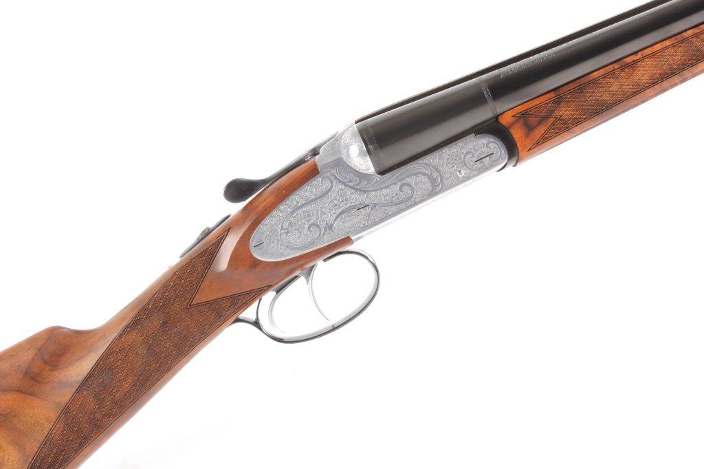 Weatherby Athena D'Italia SxS 28 GA Shotgun Deluxe: This is an excellent like new in the original box/case Weatherby Athena D'Italia side by side 28 gauge shotgun. The piece was made in Italy with all the engravings done by hand and designed by the fin