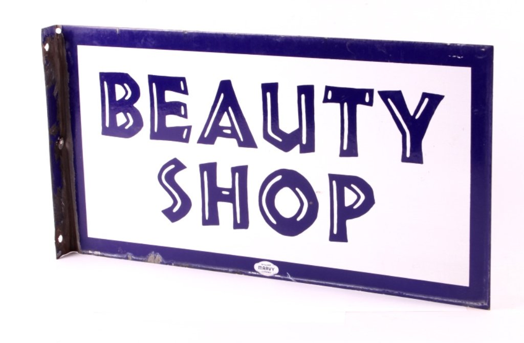 Porcelain Beauty Shop Flanged Sign: This is a porcelain beauty shop sign. The sign is double sided and flanged. It features wonderful stylized lettering. The sign is marked "William Marvey Company St. Paul 2, Minn.". The beauty shop sig