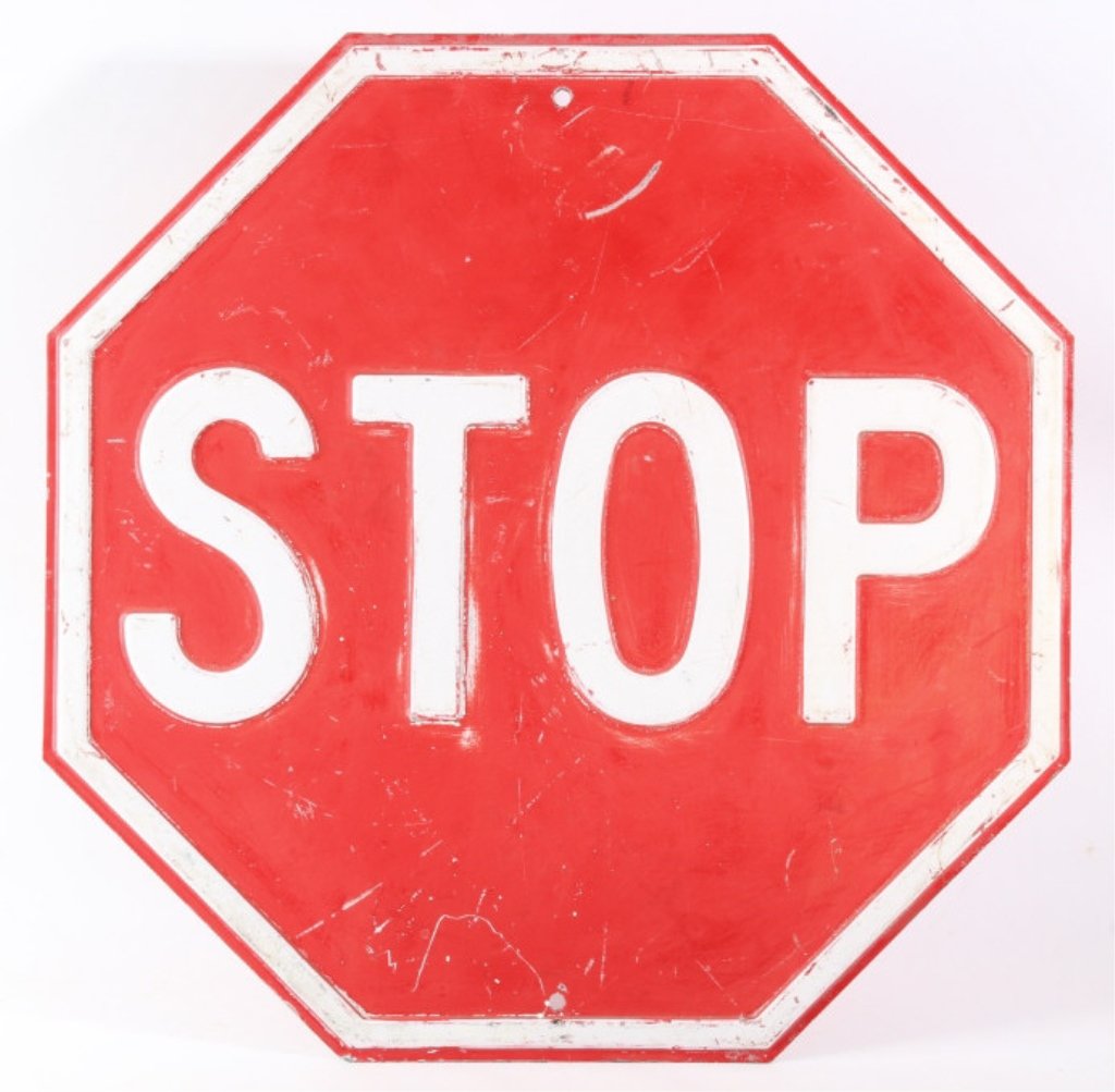 Great Falls Montana Cast Iron Stop Sign Early: This is a cast iron and embossed stop sign from Great Falls, Montana. The piece has the original red and white paint and shows overall good condition. The sign is believed to be from circa 1940's and 