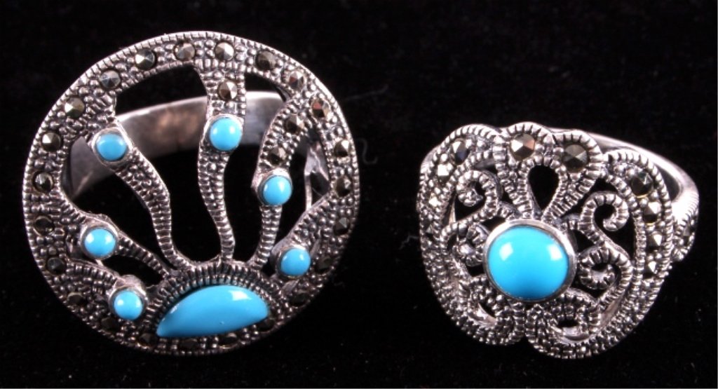 Ladies Sterling Silver Rings: This is a pair of ladies sterling silver rings. The rings are both marked "925" and show good condition. The rings are size 6 and 8.