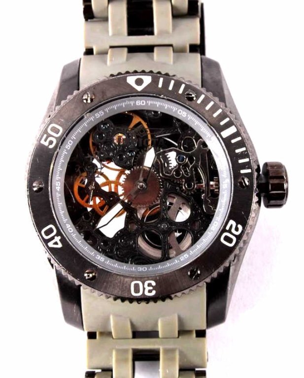Invicta 1264 Sea Spider Automatic Skeleton Watch: This is an original Invicta Men's Model 1264 Sea Spider mechanical automatic skeleton dial black polyurethane & metal band watch. The watch has a visible skeleton like design with the Flame Fusion Cry