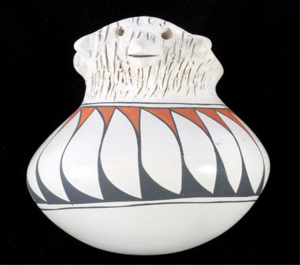 Mata Ortiz Effigy Bird Olla by Corona c. 1940-1960: The lot features a Mata Ortiz Native American Indian pottery polychrome olla by Jorge Corona. The piece shows a bird like effigy face across the top and a traditional painted design. The piece is sign