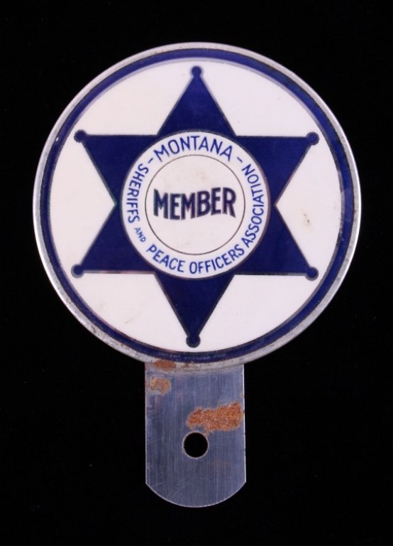 Montana Law Enforcement License Plate Topper: This is a Montana Sheriffs and Peace Officers Association license plate topper. The topper shows a 6 point star badge that reads "Montana Sheriffs and Peace Officers Association" with "Member" in the 