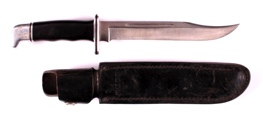 Buck 120 Fixed Blade Knife and Scabbard: This is a Buck 120 fixed blade knife and leather scabbard. The knife is marked "Buck 120 U.S.A.". The scabbard is marked "Buck 120". The knife and scabbrd are in good condition. The knife measures 11.