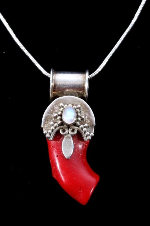 Navajo Coral Branch & Moonstone Sterling Necklace: This is a handmade Navajo Native American Indian pendant showing a rare ox blood Coral branch stone on sterling silver along with a Moonstone set in the front center. The pendant is hallmarked, ".925"