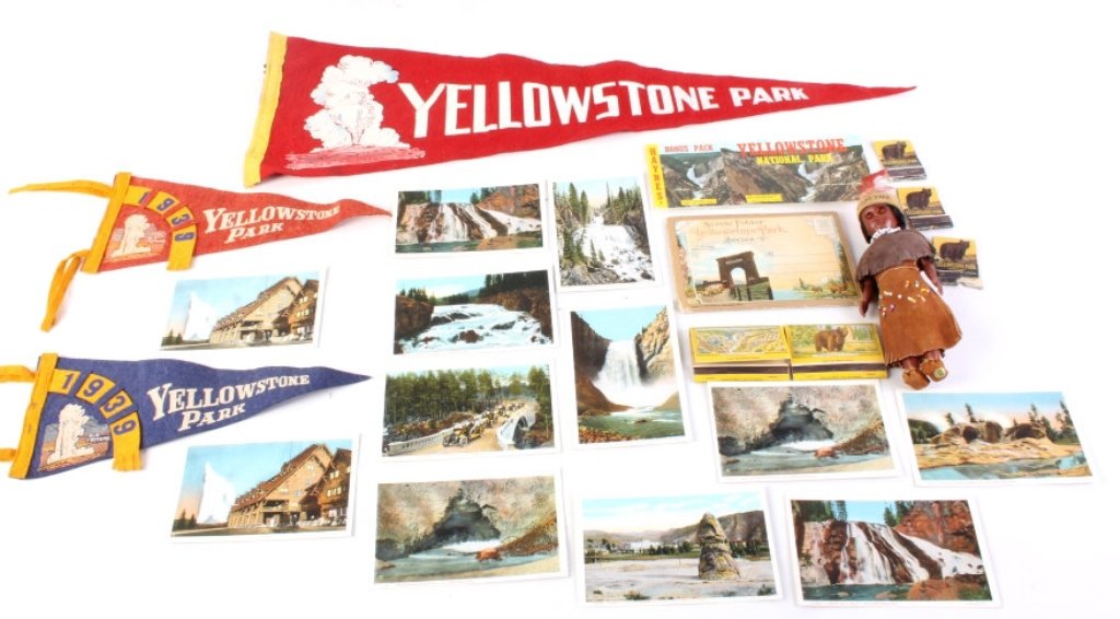 Vintage Yellowstone Memorabilia collection: Collection of Vintage postcards, pennants, matchbooks, picture fold out, and Yellowstone doll. Small Pennants from 1939 depict Old Faithful. The large pennant also depicts Old Faithful. Twelve loose p