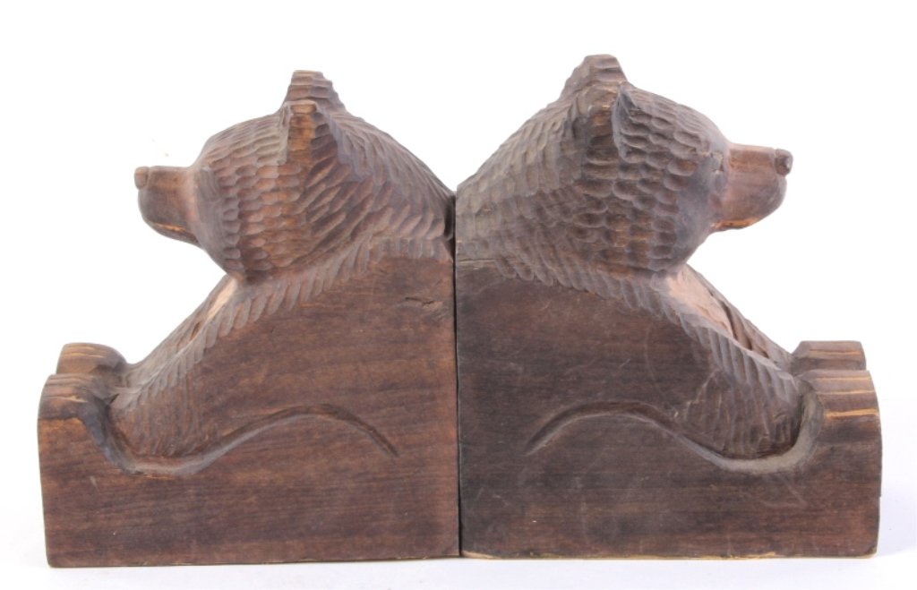 Black Forest Style Bear Bookends: Black Forest style carved bear bookends. Seem to show some age. In good condition measures 5 1/4" W x 6 1/4" H x 2 11/16" L.