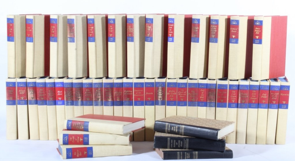 Zane Grey Western Book Collection (47 Books): The collection includes 47 Zane Grey Western books with 44 of them being hard bound in a red and tan/white canvas and three being leather hard bound. The collection of 44 were published by Walter J. B