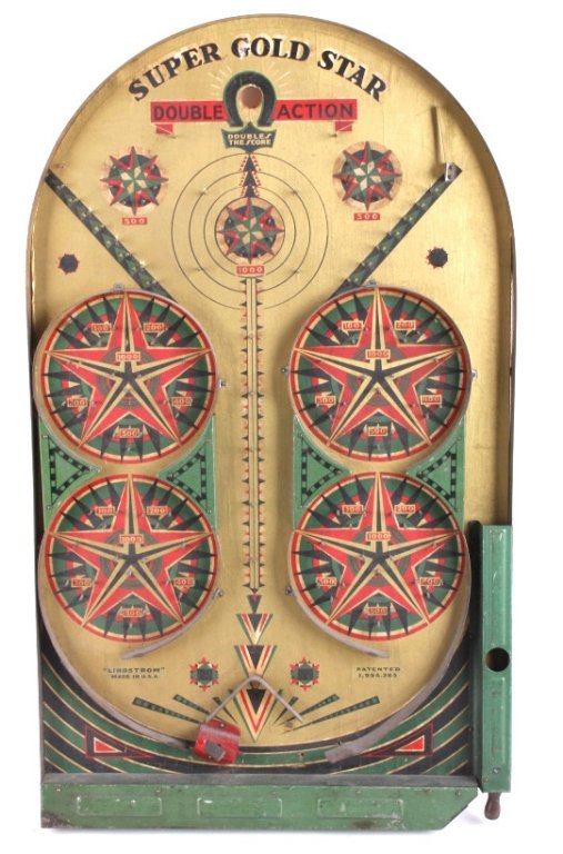 Lindstrom's Super Gold Star Bagatelle Game 1930's: This is a bagatelle like game from Linstroms Tool & Toy Company. This is the Super Gold Star game. This game was manufactured from 1932-1934. The game is made of wood and tin with very few flaws. The 