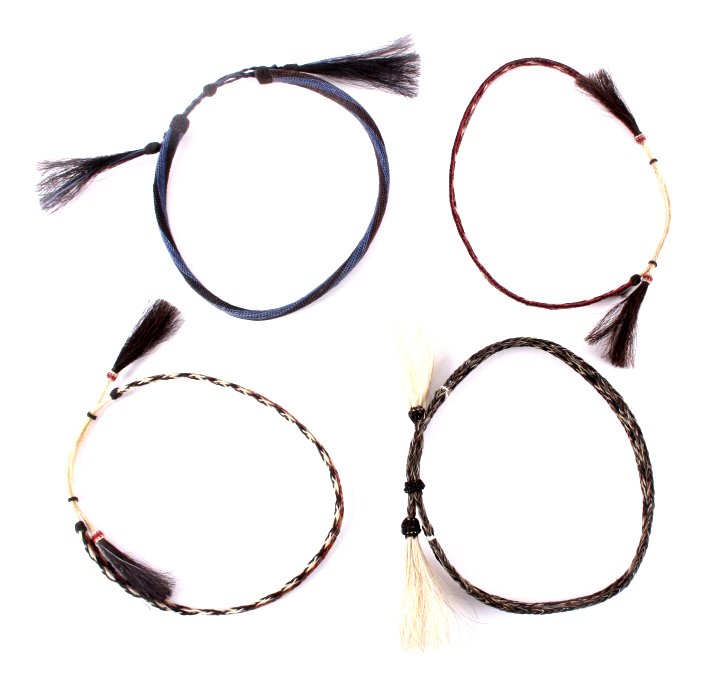 Montana Deer Lodge Prison Made Horsehair Hat Bands: This is a collection of four horsehair hat bands made in the Montana State Prison in Deer Lodge. Three of the hat bands are braided and the fourth is hitched. Each one shows excellent craftsmanship an