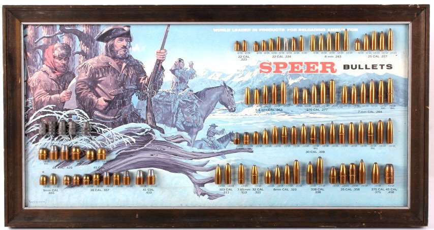 Early Speer Bullet Caliber Advertising Display: This is a Speer Bullets display. The display features bullets from .22 to .45 and all calibers in between. The bullets are displayed on a print created by artist Jack Woodson. The print shows Lewis & 