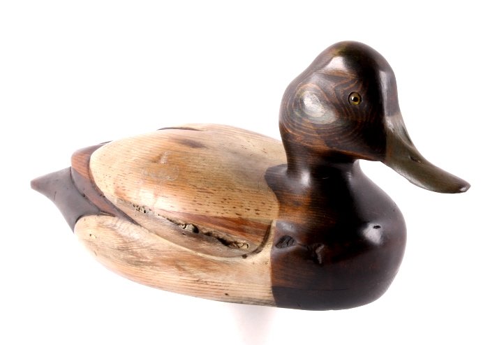 Tom Taber Carved Wooden Scaup Duck Decoy: This is an original carved wooden scaup duck decoy made by Tom Taber. The duck shows incredibly fine detail and is in good condition. The bottom has been signed by the artist. The duck measures 5.25"