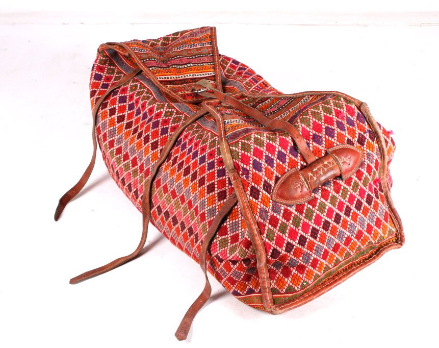 Antique Hand Woven Turkish Dowry Bag: This lot features an antique hand woven Turkish dowry bag. Bag like this one where often used to deliver the property or money brought by a bride to her husband on their wedding day. Bags this large a