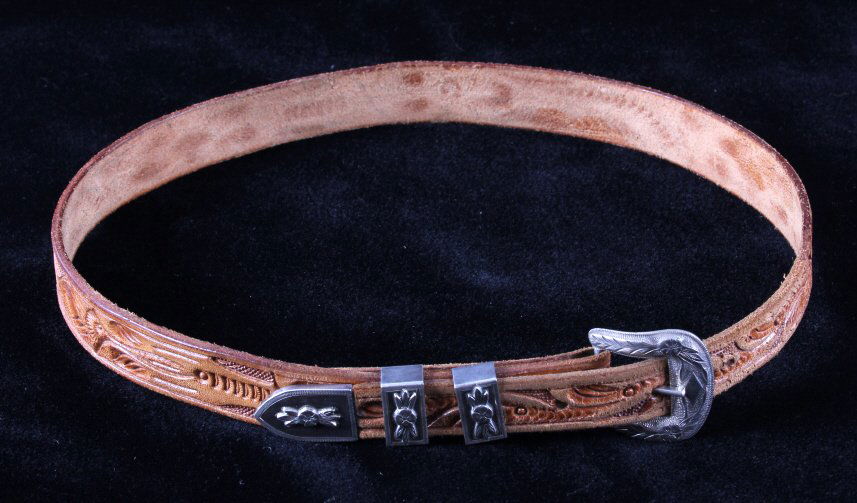 Sterling Silver Ranger Buckle Set & Leather Belt: This is a sterling silver ranger buckle set with a child's leather belt. The buckle is marked "Hecho en Mexico Sterling 925". The leather belt features a wonderful hand tooled design. The belt and ran