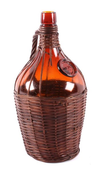 Antique Paul Jones Wicker Wrapped Whiskey Bottle: This is an antique Paul Jones Whiskey bottle. The bottle has been wrapped in wicker and features an applied glass seal that reads "Paul Jones Whiskey Louisville, Ky.". The bottle is in good overall co