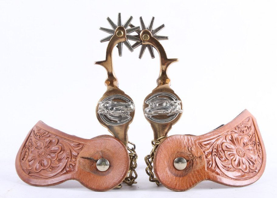 North & Judd Horse Head Bronze Spurs With Straps: This lot features a set of North and Judd horse head bronze spurs with leather strap. The leather straps are excellent crafted. In 1914 the Buermann name and design was purchased by North & Judd, a la