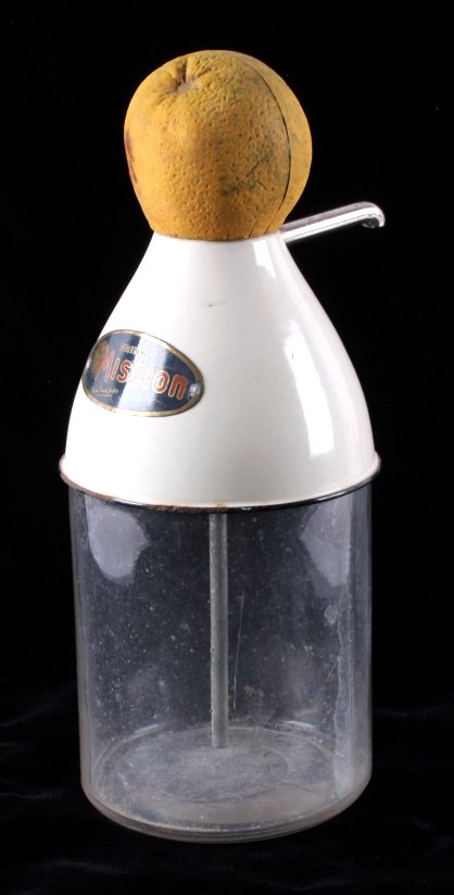 1920's Mission Orange Syrup Dispenser: This is an original Mission Orange syrup dispenser from the 1920's. The dispenser came from the Carter, Montana ice cream parlor and was once part of the Rominger collection. Carter, Montana is locate