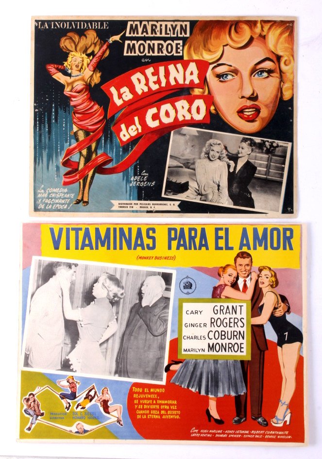 Marilyn Monroe Spanish Lobby Card Collection: This is a collection of two Marilyn Monroe Lobby cards printed in Spanish. The first is titled "Vitaminas Para el Amor (Monkey Business)" in which Monroe starred alongside Cary Grant, Ginger Rogers an