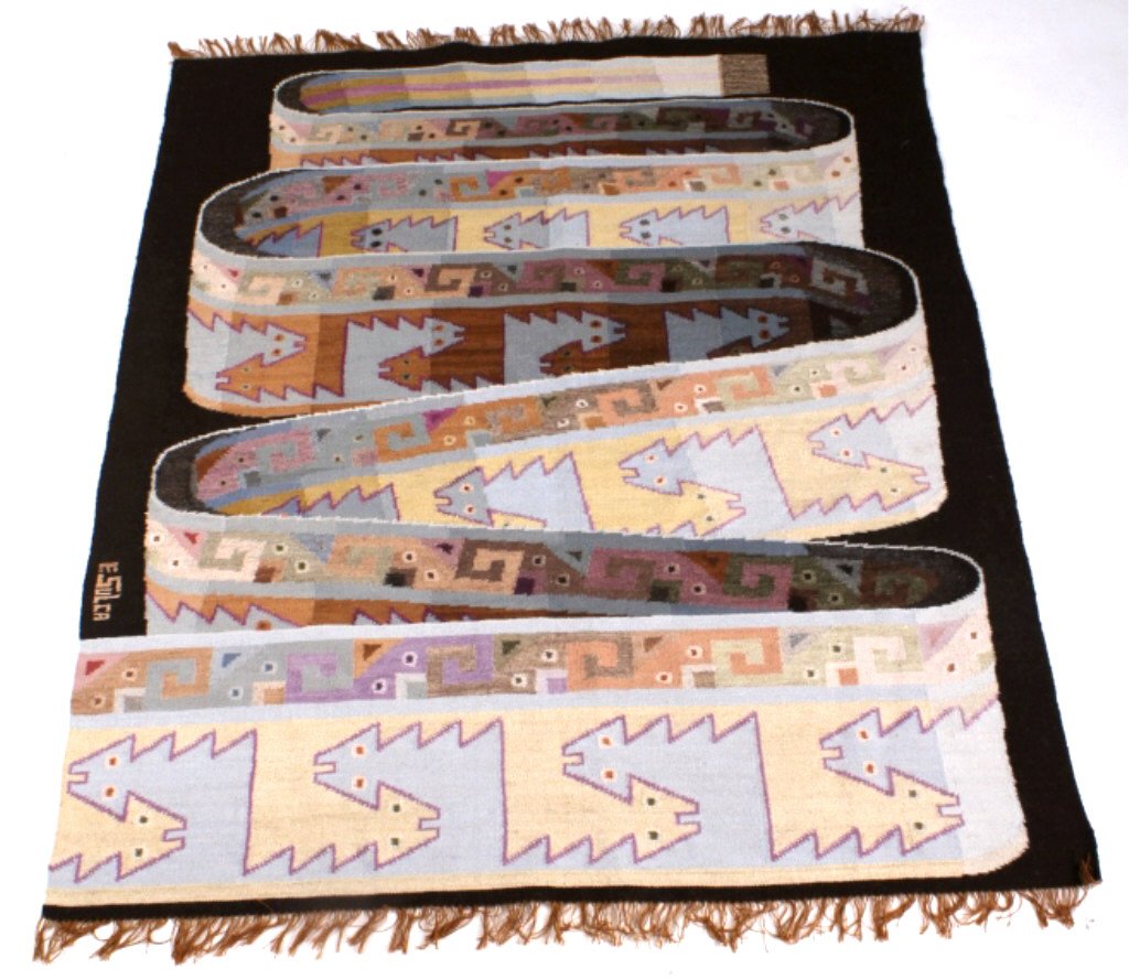 Hand Woven South American Wool Rug By E Sulca: This lot features a hand woven South American wool Rug by E Sulca. This rug is woven by famous Peruvian weaver, Eddie Sulca, and his name is woven into one corner of the rug. The piece is in good cond